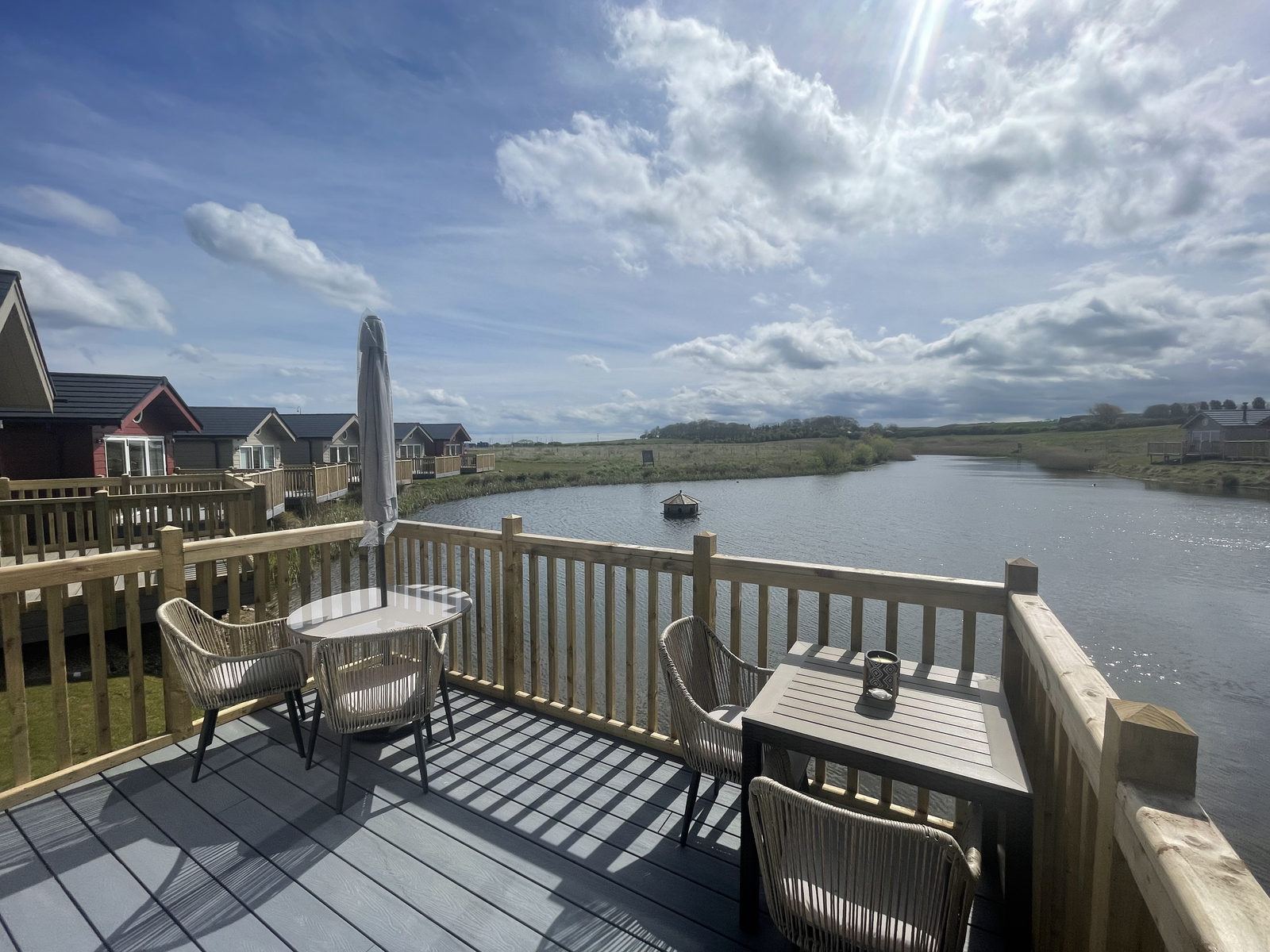 View down the lake from the decking at Lake View Lodge, The Bay, Filey